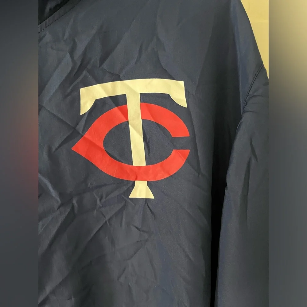Minnesota Twins hooded windbreaker with “Ford” on 1 sleeve, 2XL